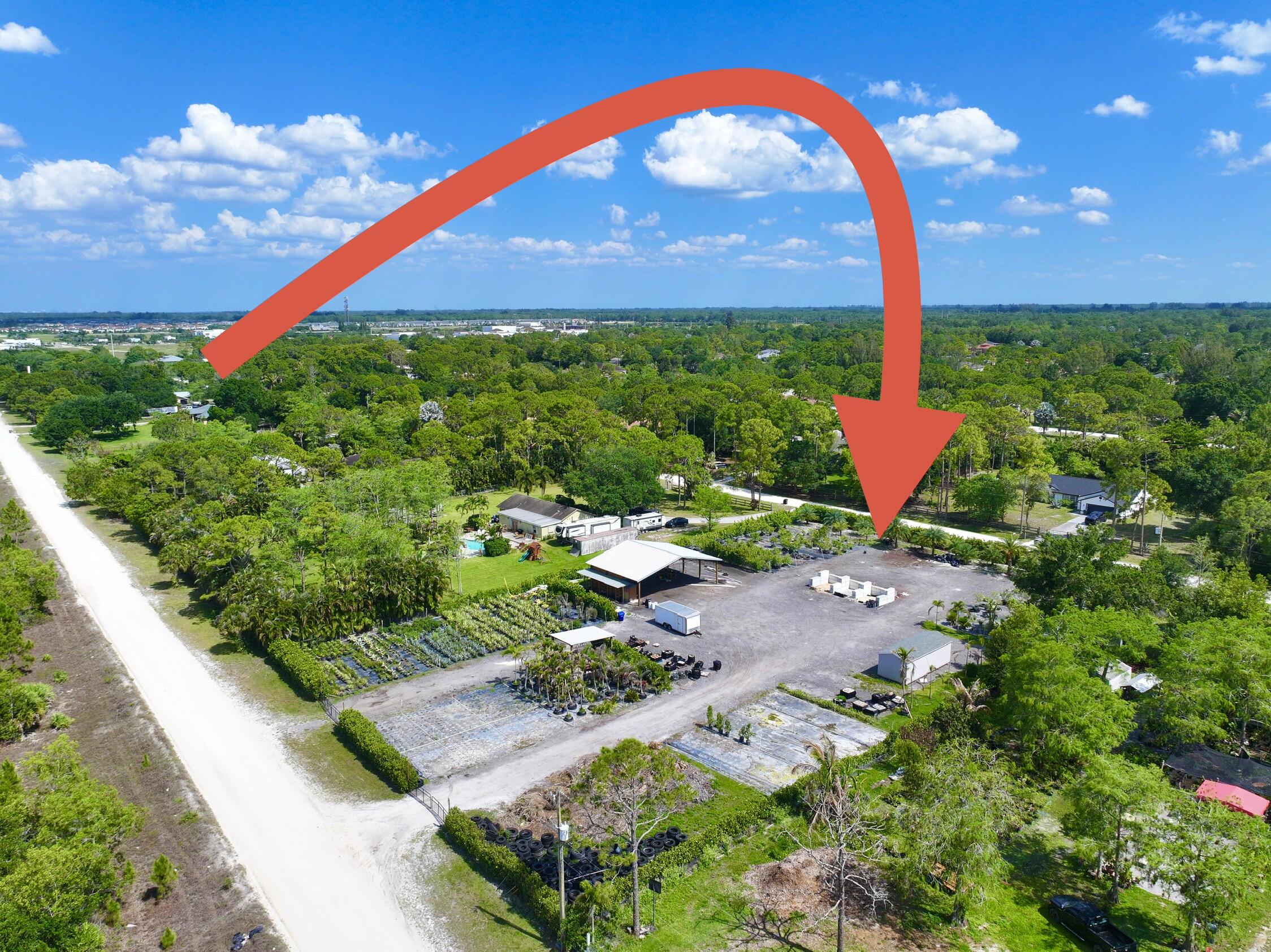 PRIVACY HEDGES ON ALL 4 SIDES  !!!***lot goes street to street  *****GREAT OPPORTUNITY  !!!  2 POLE BARNS- 36' X36' &  12'X10' !! ELECTRIC RUN FOR ICE MACHINE !!!    FULLY FENCED !!ELECTRIC !! WELL AND PUMP !!  ABOVE GROUND AND IN-GROUND IRRIGATION !! 2 GATED ENTRANCES !!!     Excellent Opportunity !!!  Landscapers !!!  Great Potential Opportunity  for Anyone  !!!!   2.07 acres !!!!!!  Pole Barn !!   Fully fenced !!!!   well  !!! Street to Street. !!!!   BUILD YOUR DREAM HOME ON THIS 2.07  ACRES LOT *** NO HOA **. ALL NICE WELL KEPT HOME ON STREET**. LOT  goes STREET TO STREET !!!!  **. MINUTES WALKING TO PUBLIX, LIBRARY , BANK, ***. !!! GREAT POSSIBLITIES ***NO HOA****BUILD YOUR DREAM HOME ON THIS NICE LOT- READY - EXCELLENT OPPORTUNITY TO OWN A 2.07 ACRES LOT IN LOXAHATCHEE WITH NO HOA !!! MINUTES TO SHOPPING, SCHOOLS, WESTLAKE ER , BEACHES , GAS , & BANKS !!!! ALL NICE HOMES ON STREET !! THE POSSIBILITIES ARE ENDLESS**. SCHEDULE YOUR PRIVATE SHOWING TODAY!!! build your dream home on this prime lot *** *** no hoa- bring your rv, boat, trailer and horses **