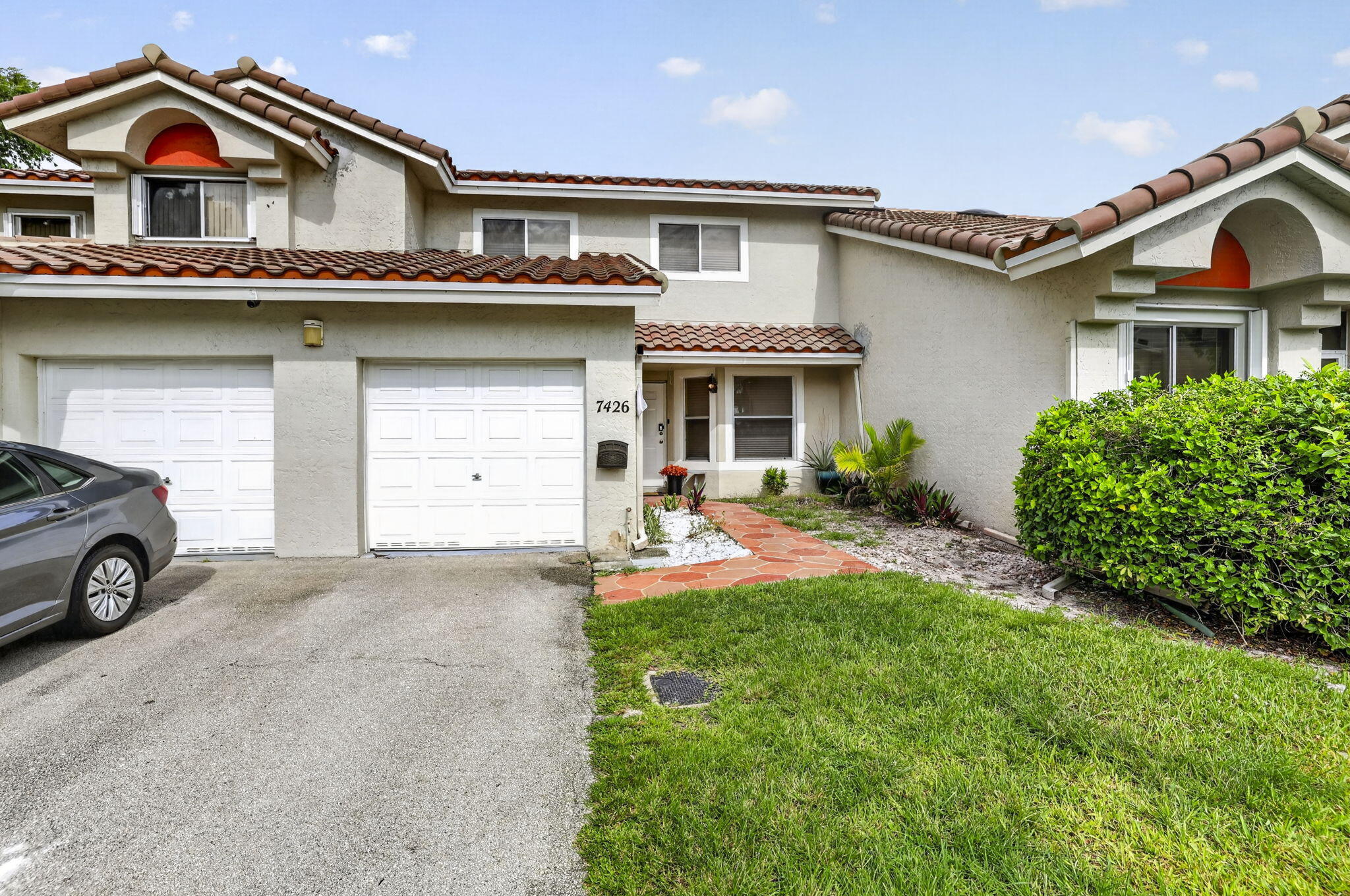 Beautiful and spacious townhome located in a highly desirable all-ages community. Brand new roof. This well-maintained residence features 4 spacious bedrooms and 2.5 bathrooms, offering a functional layout with abundant natural light and high ceilings that enhance the sense of space throughout the home. The primary suite is conveniently located on the first floor and includes a walk-in closet and a large master bathroom with Granite countertops. The main living areas offer an open-concept design with a seamless flow between the living and dining spaces, creating an inviting environment for everyday living and entertaining. The kitchen features granite countertops,  generous cabinetry, and a cozy breakfast area.  Enjoy serene views from the private courtyard overlooking lush green open areas, perfect for relaxation and outdoor enjoyment. Central vacuum system, and in-unit washer and dryer. The home is move-in ready. It can be an excellent primary residence or investment opportunity and is eligible for FHA financing. The community offers resort-style amenities including a clubhouse, fitness center, and swimming pool. HOA fees include exterior insurance, you just need a condo policy, landscaping, security, and exterior painting approximately every five years, providing peace of mind and low-maintenance living.  Tenant occupied, lease end July 27,2026      All information is deemed reliable but not Guaranteed.