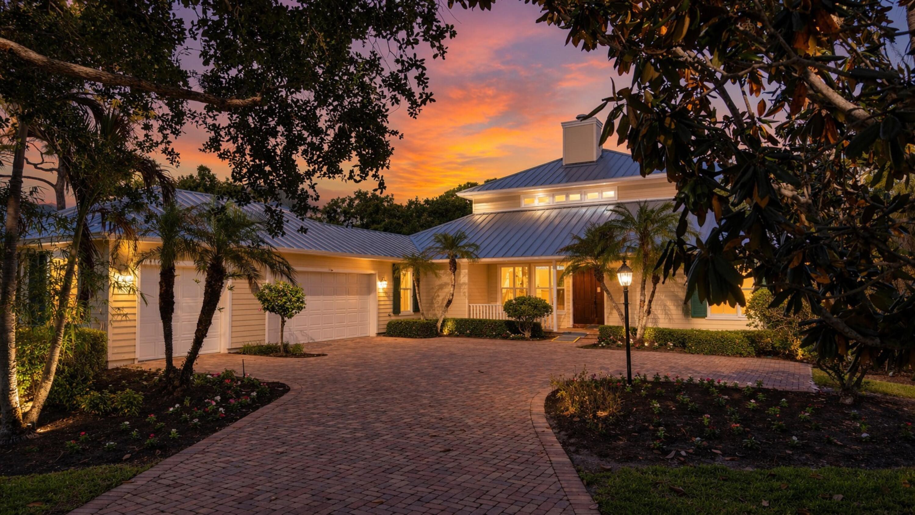 A rare opportunity awaits at 230 Oak Hammock Court SW, a custom-built masterpiece in the prestigious Indian River Club—offered for the first time ever. Set on one of the community's largest and most private lots at .63 acres, this 4-bedroom, 3 bath residence offers more than 4,300 sq ft of refined living space, a 3-car garage, a brand-new A/C unit, and a brand-new standing seam metal roof. Refreshed in 2026 including a fully painted interior, beautifully refinished real wood floors, and meticulous millwork and crown molding that showcase the craftsmanship of this one-of-a-kind home. The grand living room impresses with soaring volume ceilings clad in tongue and groove wood and a central fireplace.  The owner's suite is a retreat unto itself, featuring his and hers bathrooms, each with its own toilet and vanity, a centrally placed dual door frameless glass shower, and a luxurious jetted soaking tub. Designed for indoor outdoor living, the home features more than 800 sq ft of screened, covered outdoor living space with maintenance free composite decking and a stunning tongue and groove ceiling. Overlooking the private backyard is a large free form heated pool and spa, fully screened and surrounded by lush landscaping. Complete hurricane protection including a mix of impact windows/doors and colonial shutters provides peace of mind year-round. Life at Indian River Club is vibrant and welcoming. A limited number of full golf memberships remain available, offering access to the award-winning course. Community amenities include two heated pools (one with lap lanes), a 24-hour fitness center, and pickleball courts supported by an active social app for creating and joining games. Residents also enjoy a thriving social calendar: radio-controlled sailing, water exercise classes, Audubon birding tours, the IRC Sporting Clays Club, regular men's and women's card groups, and themed dinner nights. The clubhouse is currently undergoing a complete renovation and is slated to reopen in just a few months—ushering in a new era of dining, gathering, and community events. This is more than a home, it's a lifestyle of warmth, connection, and timeless Florida living.