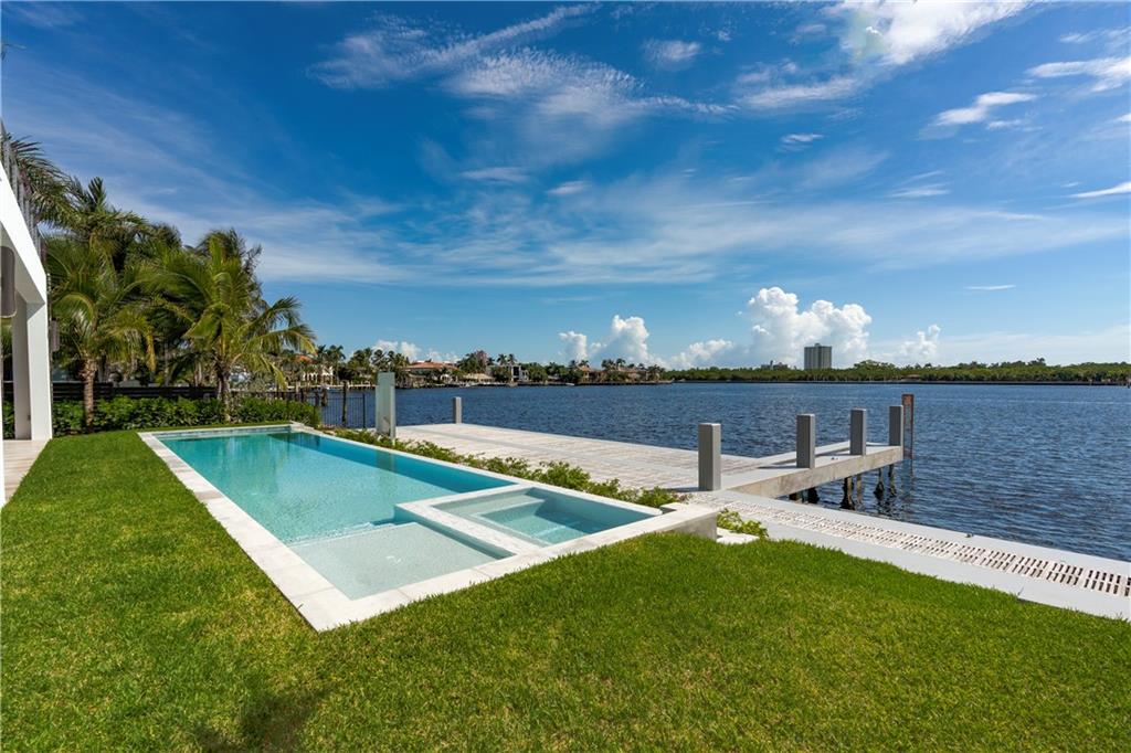 Brand New Modern Estate! Spectacular contemporary home w/+/- 82' of wide water frontage on the Sunrise Bay. Features include chef's kitchen, gas cooking,third level home theater, elevator and wine coolers. Master suite with dual bathrooms, a huge walk-in closet and fabulous views. Expansive balconies & heated pool. 3 bay garage with high ceilings can accommodate 6 cars. New 80' seawall & 1200 sq.ft. Ipe dock w/pilings. Finger dock w/ability to dock multiple boats stern-to. Breathtaking sunrise views over Birch State Park!
