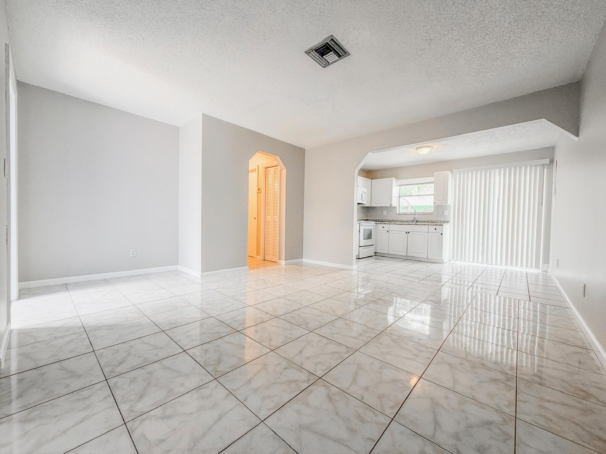Step into this charming 2-bedroom, 1-bath cottage-style apartment, filled with natural light and a warm, inviting atmosphere. The space offers comfort, character, and a layout that feels instantly like home. The landlord is attentive and genuinely committed to providing an excellent living experience for every tenant. Located just moments from Downtown at the Gardens, the Tri-Rail Station, Palm Tran, and all the best that Palm Beach Gardens and West Palm Beach have to offer, this unit delivers unbeatable convenience. This one won't stay on the market long — act quickly. WATER INCLUDED! NO PETS.