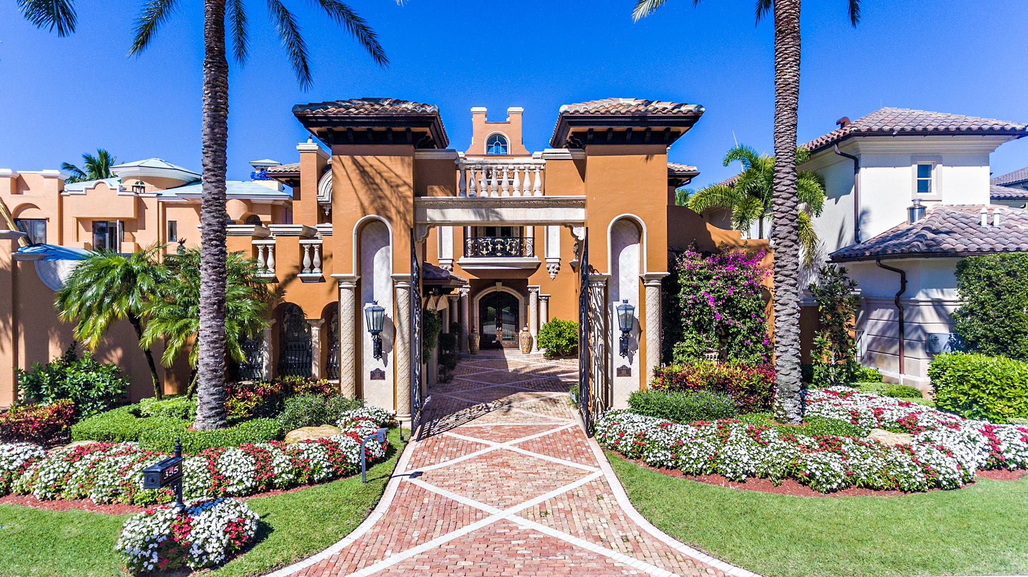 Rare opportunity to own in the ultra-exclusive ''Mizner Lake Estates'' located on the grounds of the prestigious Boca Raton Resort and Club, A Waldorf Astoria Resort. This private gated community of only 15 homes, is set among-st the fairways of the resort overlooking the 8th and 9th hole on the golf course. This lake front home was featured in Architectural Design Magazine and incorporates 4 bedrooms and 5.2 bathrooms. Special care was taken to preserve the beauty and elegance of this palatial estate. If privacy and security are requirements, look no further. The community offers 24 hour security, a manned gate and is nestled amongst some of the most private estates in South Florida.