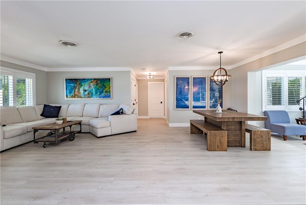 BEAUTIFUL CALIFORNIA BEACH STYLE HOME.  TOTALLY REMODELED INCLUDING IMPACT WINDOWS, NEW POOL, TILE ROOF, UPDATED KITCHEN WITH ALL STAINLESSSTEEL NEWER APPLIANCES INCLUDING WASHER & DRYER.  CUSTOM MADE CLOSET DOORS. BATHS FULLY REDONE. ELECTRICAL SYSTEM UPDATED. ALL LAMINATE FLOORING. THROUGHOUT THE HOUSE RECENTLY INSTALLED. COVERED POOL PATIO FOR PRIVATE RELAXING.  LOCATED IN A VERY QUIET NEIGHBORHOOD ON A LARGE CORNER LOT WITH FENCED BACKYARD. IN THE HEART OF THE NUMBER ONE DESIRED BEACH CITY - DEERFIELD BEACH! LOCATED NEAR SEVERAL BEST RETAURANTS, SHOPPING CENTERS, NIGHT TIME STYLE LIFE, CLUBS, SCHOOLS, GOLFING, SEVERAL PUBLIC PARKS AND POOLS, TENNIS COURTS, FISHING PIER, BOAT RAMPS, VERY EASY ACCESS TO HIGHWAYS, 5 MINTUES TO THE BEACH. SEE SUPPLEMENT REMARKS FOR MORE INFO.