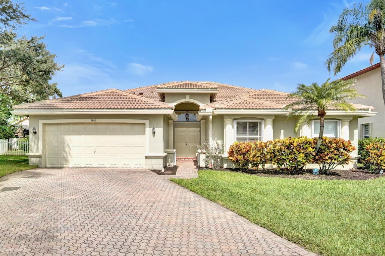 Welcome home to this beautifully updated 4-bedroom, 2.5-bath pool home located in the highly desirable gated Bay Hill Village subdivision of Winston Trails. Situated on a .22-acre cul-de-sac lot, this Venice model offers nearly 2,400 square feet of living space with a functional split floor plan and modern upgrades throughout.  Interior features include neutral paint, tile flooring throughout the main living areas, and a renovated kitchen with white cabinetry, granite countertops, and stainless steel appliances. The primary suite offers high ceilings and a fully updated bathroom with contemporary finishes and an oversized walk-in shower. Secondary bedrooms are privately located and all include walk-in closets. All bathrooms have been tastefully remodeled, and second bath features a      deep soaking tub.    Enjoy outdoor living with a covered patio, screened-in pool, and spacious fenced backyard with distant lake and golf course views.  Recent upgrades include a 2024 roof, new gutters, June 2026 air conditioner, 2019 water heater, accordion shutters, impact front entry doors, impact glass French doors and impact cabana bath door.  The home boasts a two-car garage complemented by an expansive driveway with space for up to four vehicles. Winston Trails is a guard-gated community offering resort-style amenities including a community pool, tennis and pickleball courts, playgrounds, golf course with no mandatory membership, driving range, on-site restaurant, and fitness center with resident rates. Zoned for A-rated schools: Manatee Elementary, Christa McAuliffe Middle, and Park Vista High. HOA includes Comcast cable and internet.  INFORMATION HEREIN NOT GUARANTEED AND SUBJECT TO ERRORS & OMISSIONS. ALL MEASUREMENTS APPROXIMATE.