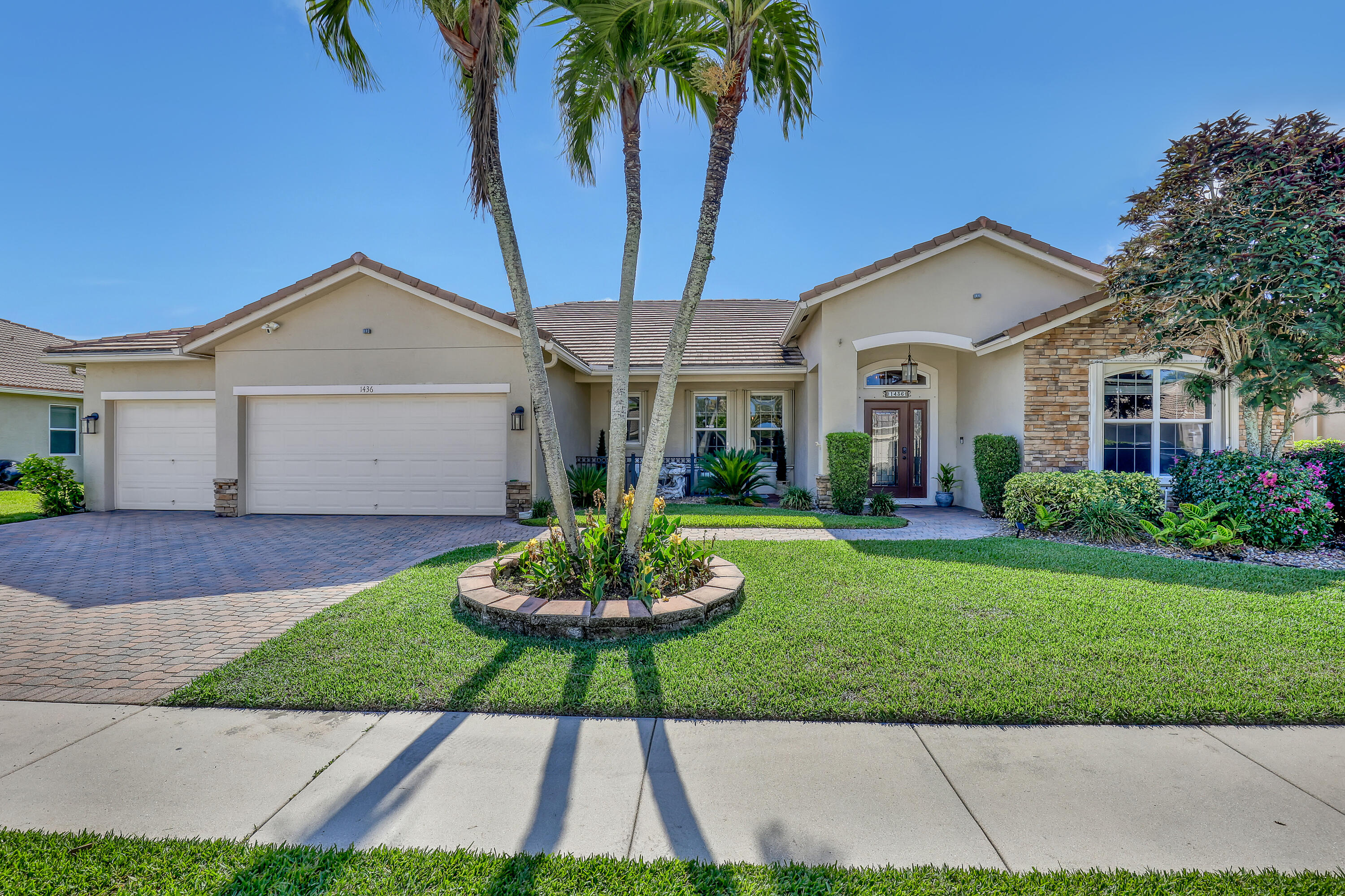 First time available for a season. Utilities and bi-weekly cleaning are included!!!! This immaculate home is very tastefully furnished and has everything you need to enjoy your winter season in Florida.  Each bedroom has private bathroom, there is an office, dining room, open kitchen and family room, outdoor kitchen, pool, fenced in yard and amazing lake views.  This home is perfect to entertain or relax after a long day. You can't beat the location. Only 6 miles to WEF, 5 miles to NPC, 7.5 miles to Palm Beach international and 11 miles to Palm Beach.  Shopping and entertainment are right out the front gates of this quiet and private community. Clubhouse has a heated pool, tennis, pickleball, fitness center, 35 acre pond for fishing and 4 parks.  This home does not disappoint!!