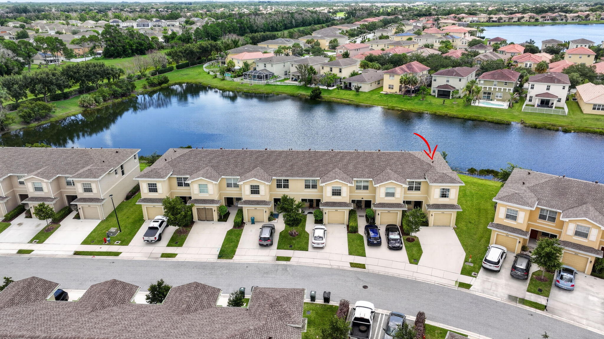 Vizcaya Falls in Torino offers wonderful amenities at a lakefront clubhouse with a resort style pool, fitness center, volleyball, tennis, basketball, community room, game room, playground with slash area and gas grill for pool party picnics.  Beautiful lake view end unit townhome with 3 bedrooms and 2 1/2 baths and large 1 car garage with electric car plug in.  Gorgeous white kitchen cabinets, large pantry,  granite counter tops with tiled flooring on main level. Master bedroom with lake view, large walk in closet, dual vanities and walk in shower. Minutes to I-95 and the Atlantic Ocean, beaches, parks, inlet, shopping and Mets stadium.  Monthly fee includes all amenities, lawn care, roof maintenance, internet, security monitoring, Call today for a private tour.