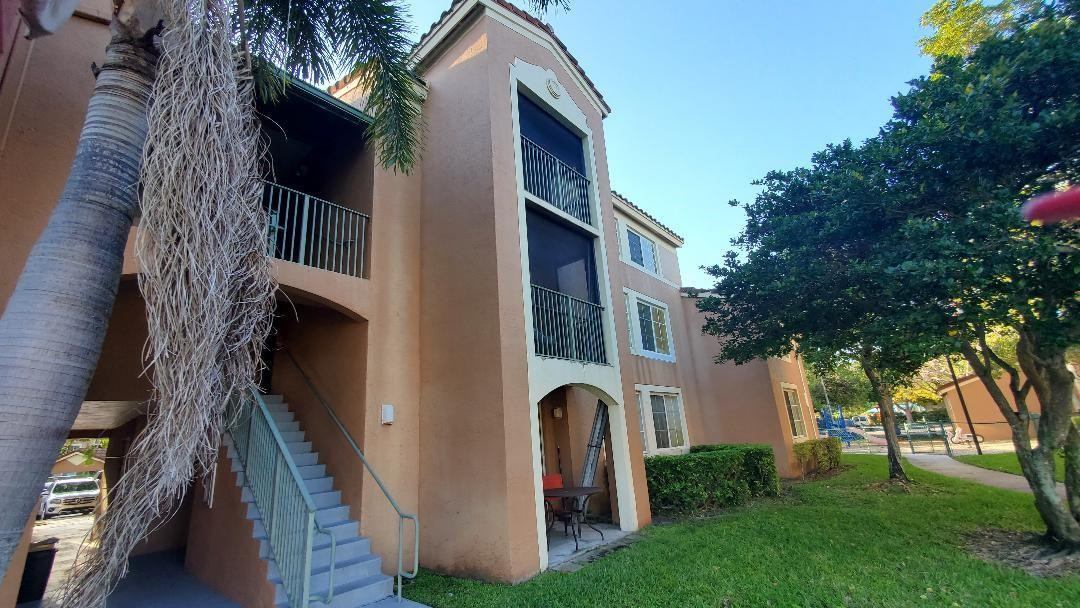 GREAT PRICE FOR THIS LAKE VIEW CORNER CONDO 2B/1B VAULTED CEILING 3RD FLOOR UNIT IN DESIRABLE CARRINGTON. UNIT COMES WITH A 1 CG. SOLD AS-IS,  NEEDS TLC, CASH ONLY SALE PERFECT FOR AN INVESTOR OR FOR MAKING THIS YOUR STARTER HOME!***WALK-IN CLOSET IN MASTER BEDROOM. BRAND NEW WATER HEATER.  VERY LIGHT & BRIGHT UNIT. ALL ROOMS ARE OVERLOOKING THE PEACEFUL LAKE. ***AMENITIES INCLUDE POOL, SPA, PLAYGROUND, FITNESS CENTER AND TENNIS COURT. CLOSE TO PROMENADE OUTDOOR SHOPPING MALL, SEMINOLE CASINO AND MAJOR HIGHWAYS. ***THIS CONDO HAS A FULL SIZE WASHER & DRYER. UNIT IS IN THE 1ST BUILDING NEXT TO COMMUNITY POOL. STEPS AWAY TO THE POOL, CLUBHOUSE & CHILDREN PLAYGROUND. CARRINGTON IS A GATED COMMUNITY.  ROOFS ON THE BUILDINGS ARE BRAND NEW.