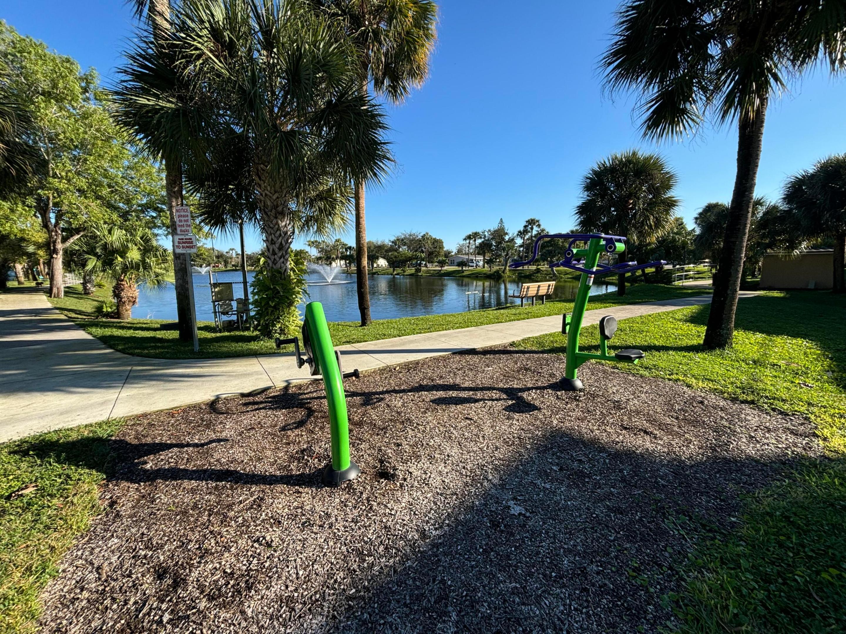 Welcome to 725 Lori Drive #203, a well-maintained 1-bedroom condo offering a premium canal view and a dedicated parking space right next to the staircase. The unit features a clean interior and monthly pest control for added peace of mind. The community provides exceptional amenities including two pools, a gym, library, billiards, bocce, shuffleboard, mini-golf, a ballroom, elevators, and scenic Frost Lake walking trails. It's also conveniently located to the local fire department and sheriff's office. This inviting 55+ condo combines comfort, convenience, and a vibrant lifestyle, all in one place.