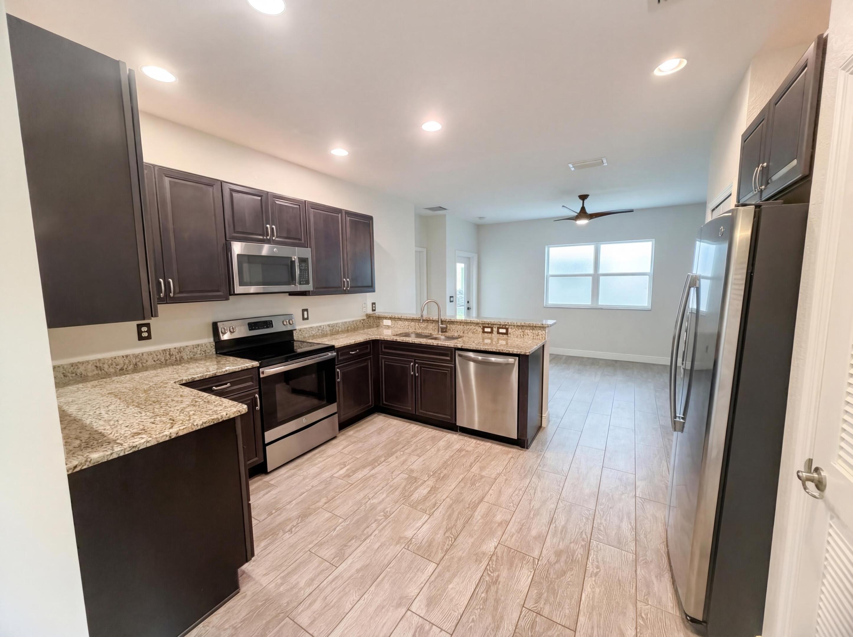 Welcome to 758 NE Hawks Ridge Way. The floor plan includes all stainless steel appliances. The layout incorporates double sinks in primary bathroom. This residence features a standard build on a concrete foundation with exterior wood siding and composition shingles. The interior walls consist of painted drywall over wood framing and neutral carpet flooring. Included 100-Day Home Warranty with buyer activation