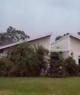 This 3 bedroom 2.5 bath home offers a spacious living room, a eat in kitchen that opens to the pool and patio area. The master bedroom host lots of windows for sunlight and on suite master bathroom. Close to shopping, schools, local beaches and the Florida Turnpike this property has it all. This is a homepath property.