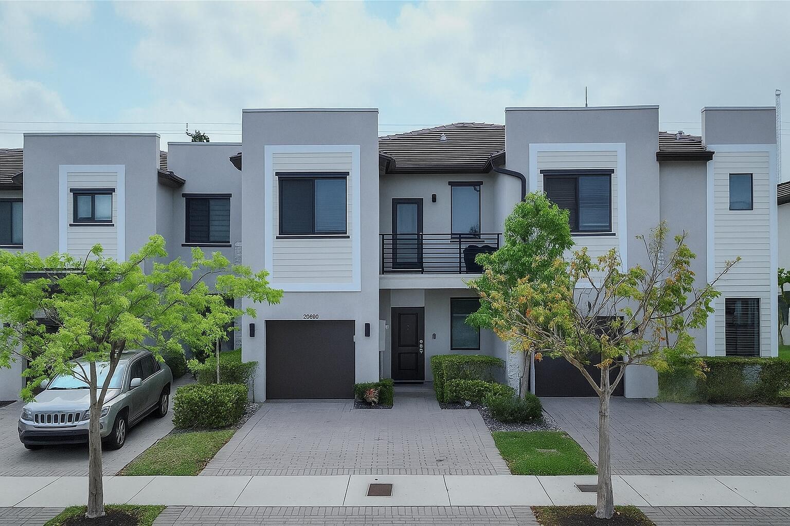 This townhouse offers unobstructed views of a scenic natural lake, making it one of a kind. partially furnished with 55"and 65" TVs installed in each bedrooms besides one more in the family room; new furniture from well-renowned companies such as Crate and Barrel and Pottery Barn adds a distinctive touch to this unit. Furniture is available, but not mandatory.