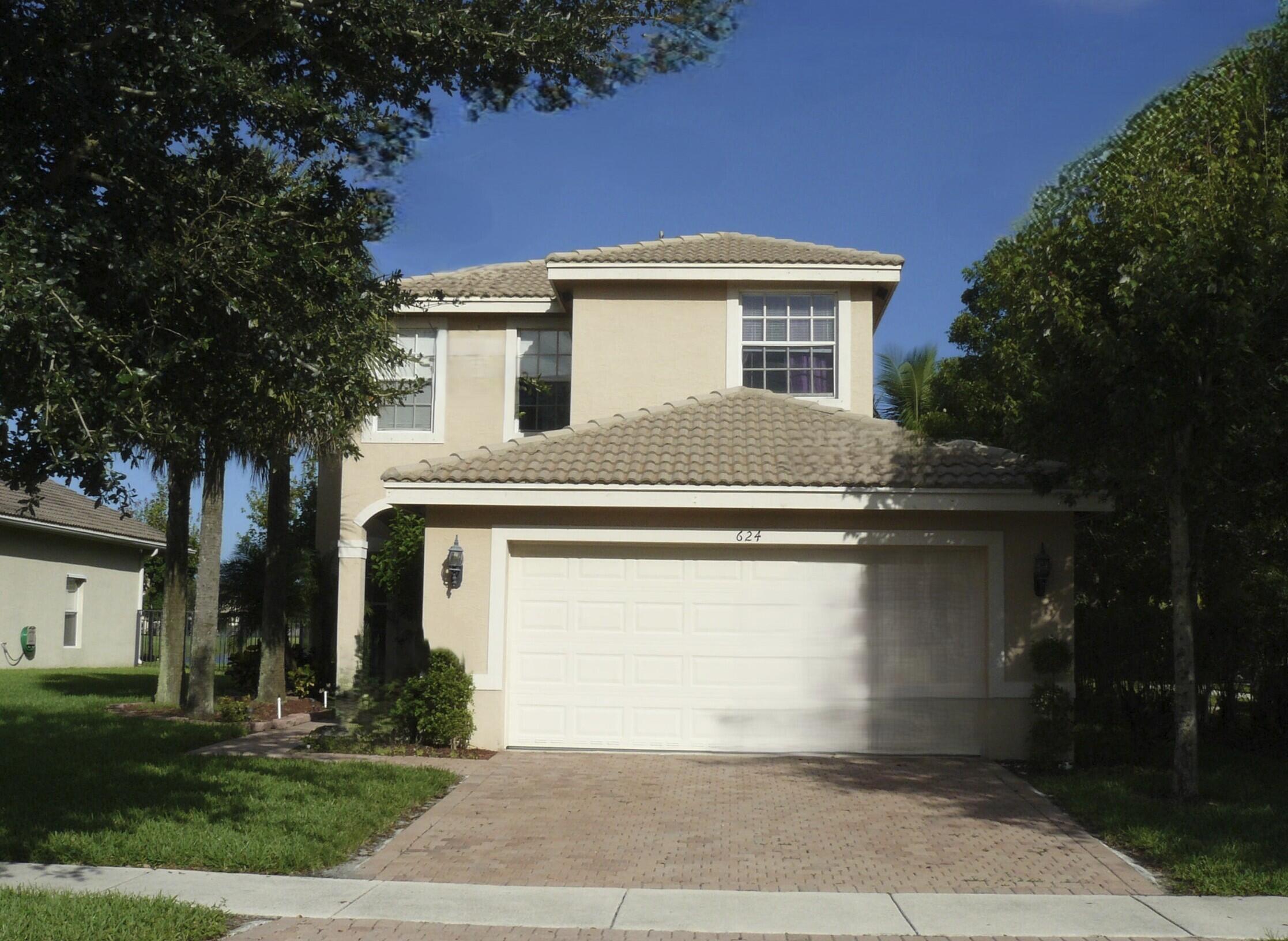 Pictures Coming Soon! Don't miss this exceptional lakefront opportunity—one of the best values in the community! This spacious 5-bedroom, 3-bath home with a 2-car garage offers stunning long lake views and an unbeatable location just steps from the community clubhouse.  Designed for comfortable living and entertaining, the home features formal living and dining rooms, a generous family room, and an open kitchen with granite countertops and stainless steel appliances. A first-floor bedroom and full bath provide flexibility for guests or a home office, while crown molding throughout adds an elegant touch.  Enjoy resort-style community amenities, including a fitness center, swimming pool, tennis courts, basketball court, playground, and the security of a gated entrance. Ideally located near shopping, dining, and everyday conveniences, with Calypso Bay Waterpark just a short walk away. This home combines space, location, and beautiful waterfront views in one outstanding package.