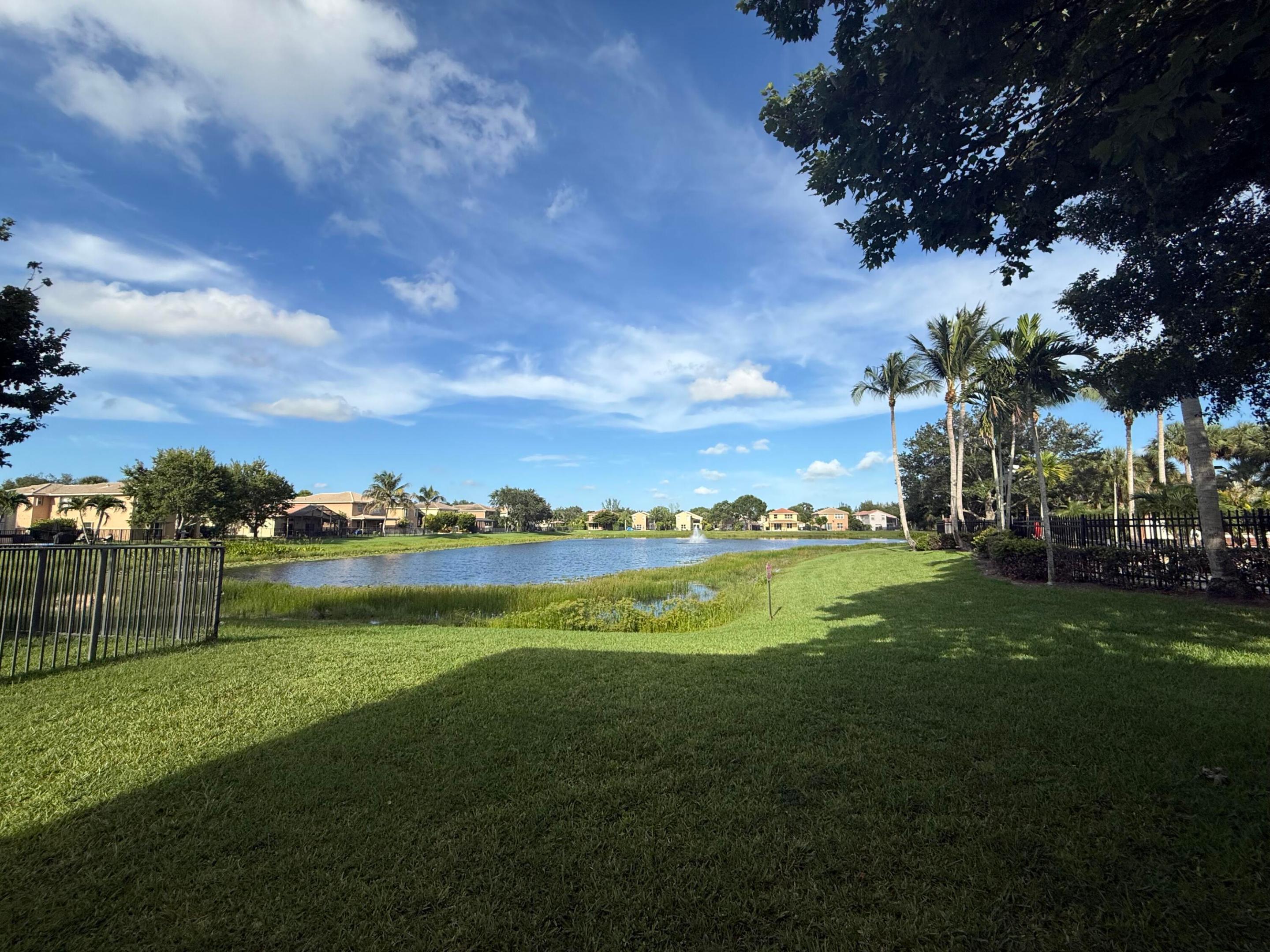 Pictures Coming Soon! Don't miss this exceptional lakefront opportunity—one of the best values in the community! This spacious 5-bedroom, 3-bath home with a 2-car garage offers stunning long lake views and an unbeatable location just steps from the community clubhouse.  Designed for comfortable living and entertaining, the home features formal living and dining rooms, a generous family room, and an open kitchen with granite countertops and stainless steel appliances. A first-floor bedroom and full bath provide flexibility for guests or a home office, while crown molding throughout adds an elegant touch.  Enjoy resort-style community amenities, including a fitness center, swimming pool, tennis courts, basketball court, playground, and the security of a gated entrance. Ideally located near shopping, dining, and everyday conveniences, with Calypso Bay Waterpark just a short walk away. This home combines space, location, and beautiful waterfront views in one outstanding package.