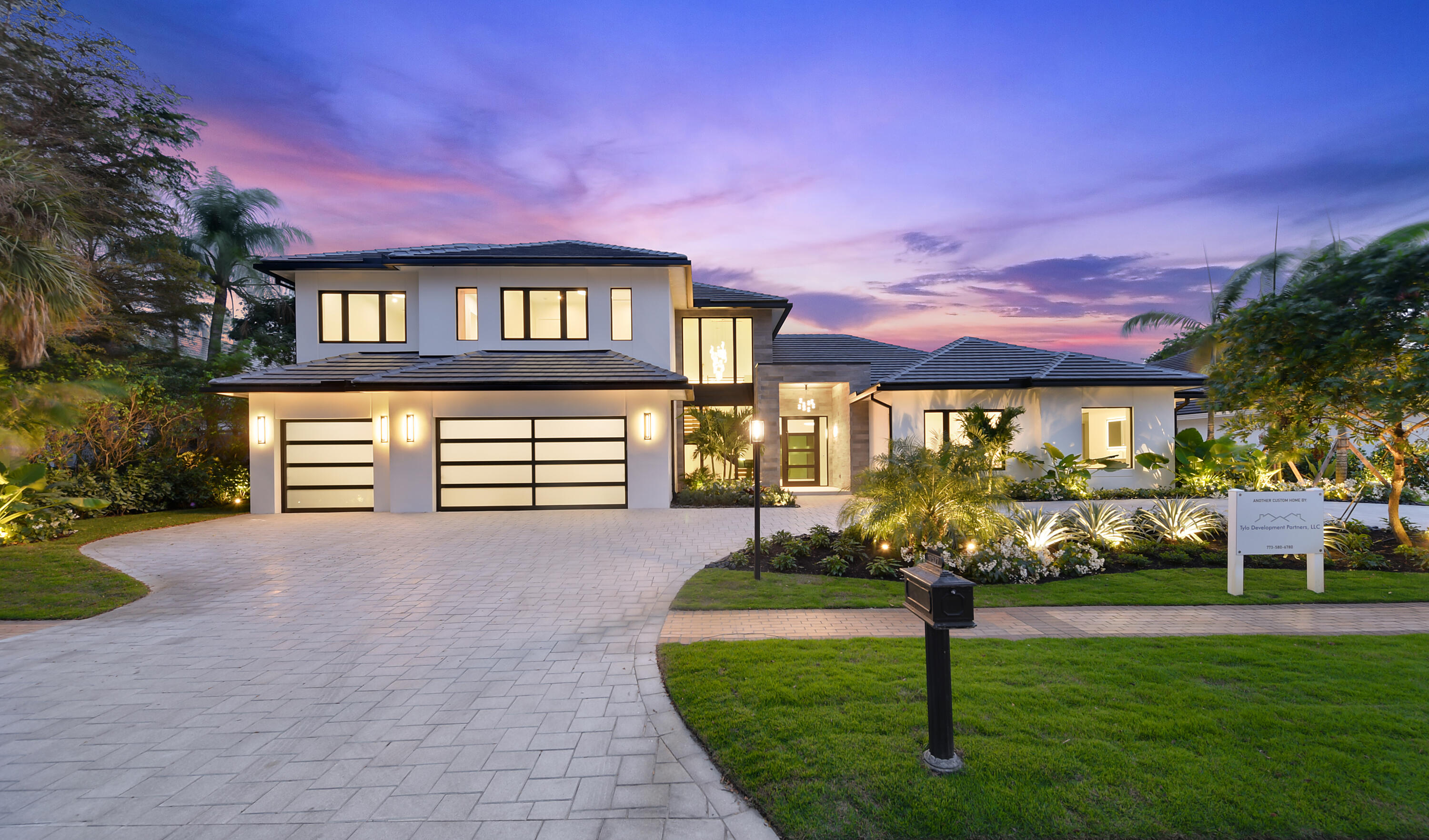 NEW CONSTRUCTION BY DISTINGUISHED BUILDER TYLO DEVELOPMENT. Characterized by spectacular exterior and interior architectural elements, this prestigious contemporary residence features 5 bedrooms, 5.1 baths with approximately 5,000 sq ft of air-conditioned living space and is located on a private cul-de-sac street with spectacular golf and lake views in St. Andrews Country Club. Beautiful large format Porcelanosa Stone flooring throughout, custom designed wood floating stairs with glass rails and tread lighting, 84'' water vapor electric, linear fireplace in great room and LED lighting with Lutron RadioRA 3 control system. The first floor includes a great room with 19 ft ceilings, a large gourmet chef's kitchen with custom designed European kitchen cabinets, 11 ft by 5 ft center island with stone top and waterfall edge, state-of-the-art appliances, spacious dining area, and a media lounge and office, all designed for effortless entertaining or casual living. The primary suite includes oversized wet room shower with Axor fixture, 70"x36" free standing custom-built polished stone tub and custom shower glass and generous high-end custom fitted closets with LED lighting. An additional en-suite bedroom completes the downstairs. Three en-suite bedrooms, a large game loft area and laundry room complete the upstairs.((The lushly landscaped property features a dramatic resort styled 16'x38' heated, linear saltwater pool with 8'x10' spa, playa, fountain and seating shelf, an oversized exterior CBS pergola/family area with porcelain floor, summer kitchen, pizza oven, and TV area. Other features include high performance hurricane resistant windows and doors, Control 4 Smart Home, 10 camera security system, keyless electronic smart locking system, full house generator with 1,000 gallon propane tank and custom paved circular driveway with oversized 3 car garage with Epoxy flooring and extra height for car enthusiasts.

SCHEDULED TO BE COMPLETED MID-FEBRUARY. ABSOLUTELY NO ENTRY WITHOUT REPRESENTATIVE