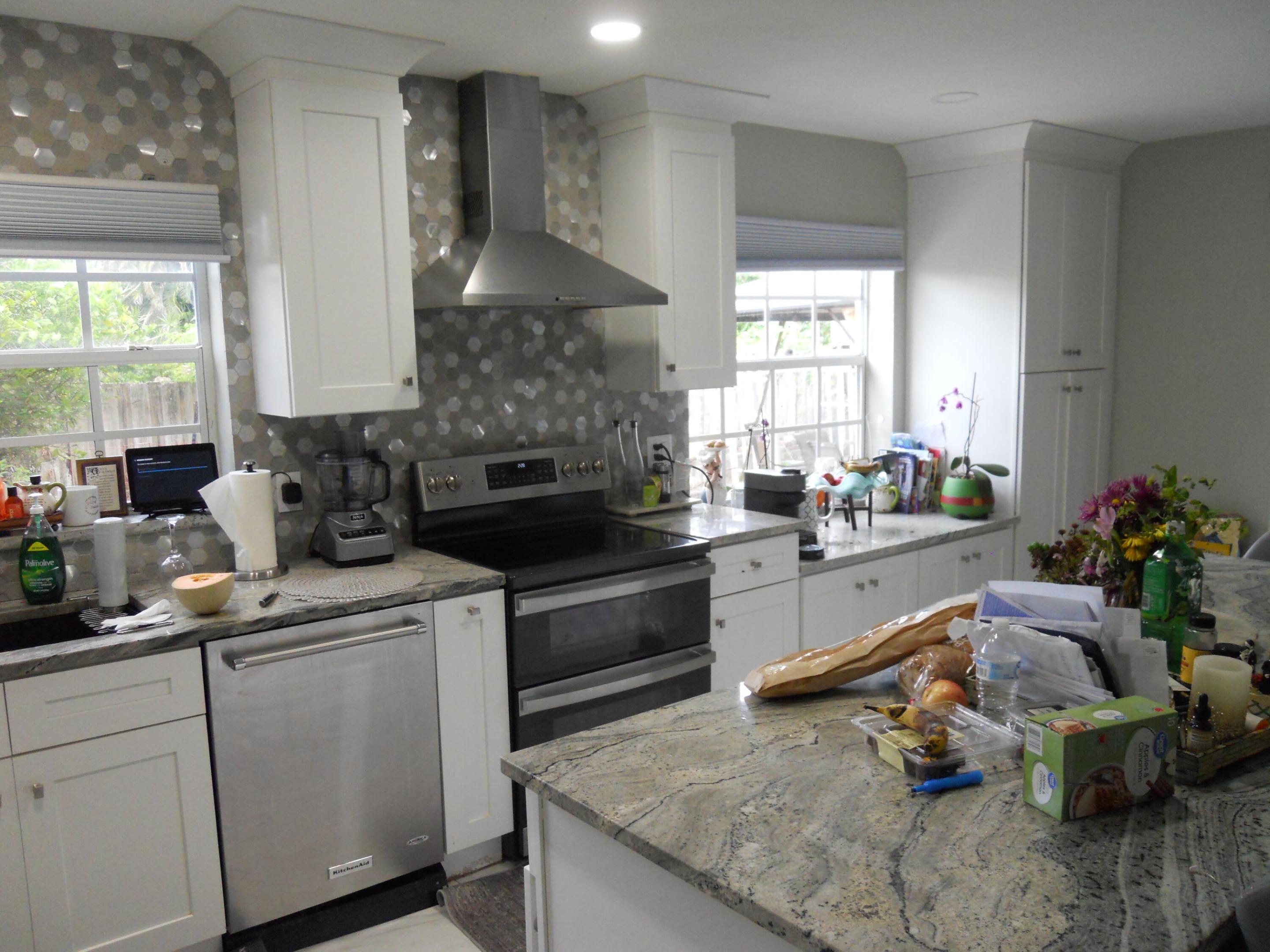 Nice size home in Forest Hills, with updated kitchen and baths, LED lighting, paver driveway, entrance and backyard. This is home has a 4-bedroom, 2-bath, plus an office and a large pool! Very open island kitchen concept, light and bright throughout!