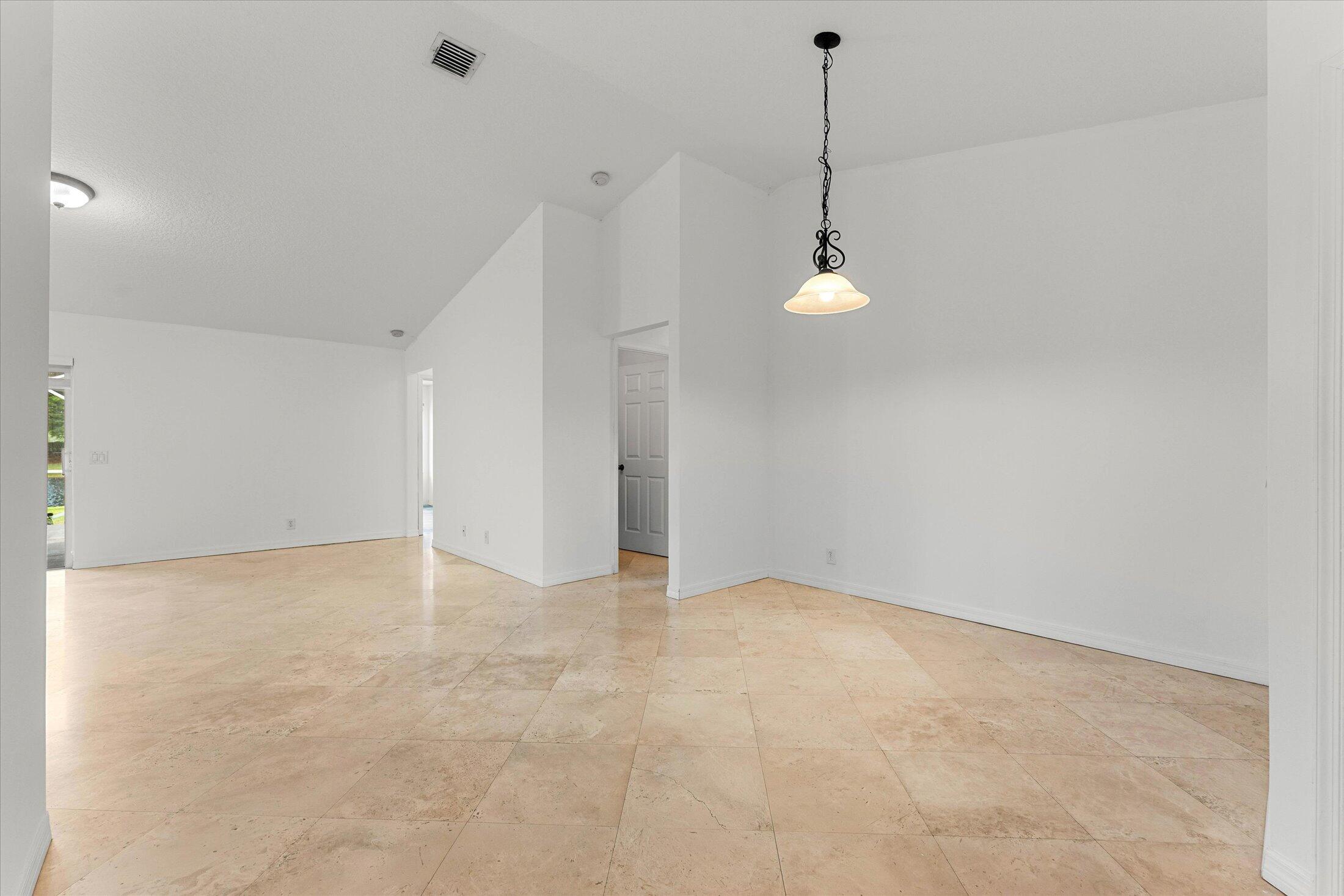 Beautiful 3 bedroom, 2 bath one-story lakeview home located in the desirable guard gated community of Savanna. Situated on an oversized lot, this home features marble floors throughout the living areas. The primary suite offers two walk-in closets and a modern, stylishly renovated bathroom. Newer A/C & Nest thermostat, fresh interior paint, and 2 car garage, Enjoy relaxing lake views from the screened patio. Savanna offers resort-style amenities, including pools, clubhouse, playground, sports courts, and more. Zoned for A+ schools.