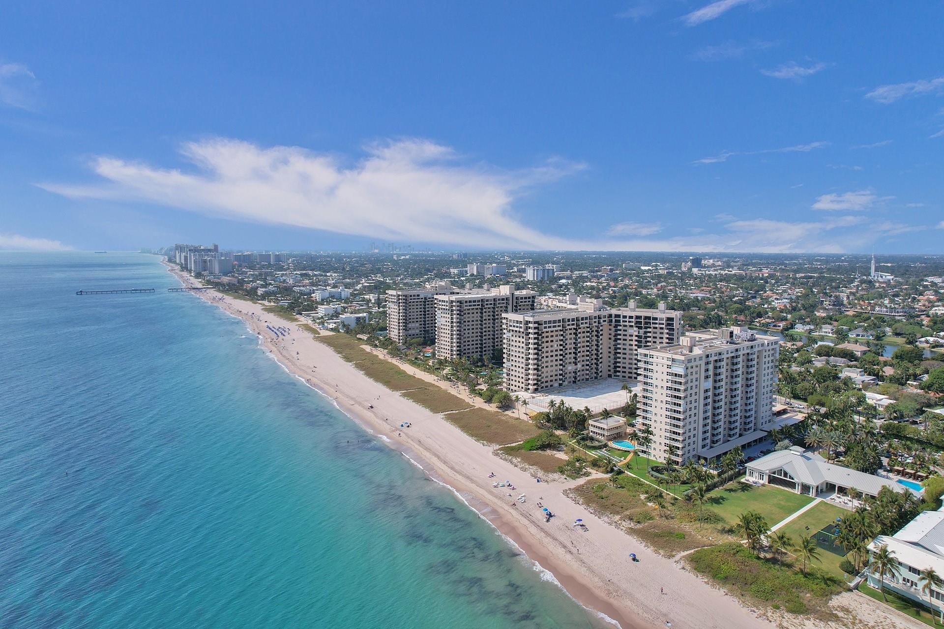 STUNNING CONDO WITH UNOBSTRUCTED OCEAN AND CITY VIEW FROM EVERY ROOM! Completely renovated Kitchen, Baths, Flooring, Electric. This beautiful unit faces the North East side of the building. 2 Bedrooms and 2 Bathrooms, ceramic flooring throughout, new A/C, hurricane impact windows and doors, assigned covered parking spot. It is move in ready! Sea Ranch Lakes North Building is Professionally managed and offers: Doorman 24hrs, oceanfront living, beautiful tropical landscaped surroundings, pool, BBQ area, fitness center, sauna, card room, clubhouse with full kitchen, and holds great reserves. It Is walking distance to the Publix shopping centers and downtown Lauderdale-by-the-Sea, 25 minutes to Fort Lauderdale airport.