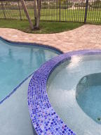 Exquisite property with pool and spa.  On wide freshwater canal, navigable for miles to area lakes. Kayak to nearby nesting/resting ground of Florida large birds. Fish for bass from your back yard. Waterski in nearby lakes. Home is pristine, up to date and well appointed. Quiet location yet convenient to all amenities and necessities. 3 miles to beaches, walking/biking distance to shops and restaurants. Great Nature Preserves within a few miles.  ps. Windows/doors/garage door are all impact resistant. Sliders are exceptions, have shutters. Gas heater for pool. Pool fence. New window treatments and buit-in wall unit in living room remain. Definitely worth a good look. Much success to all.