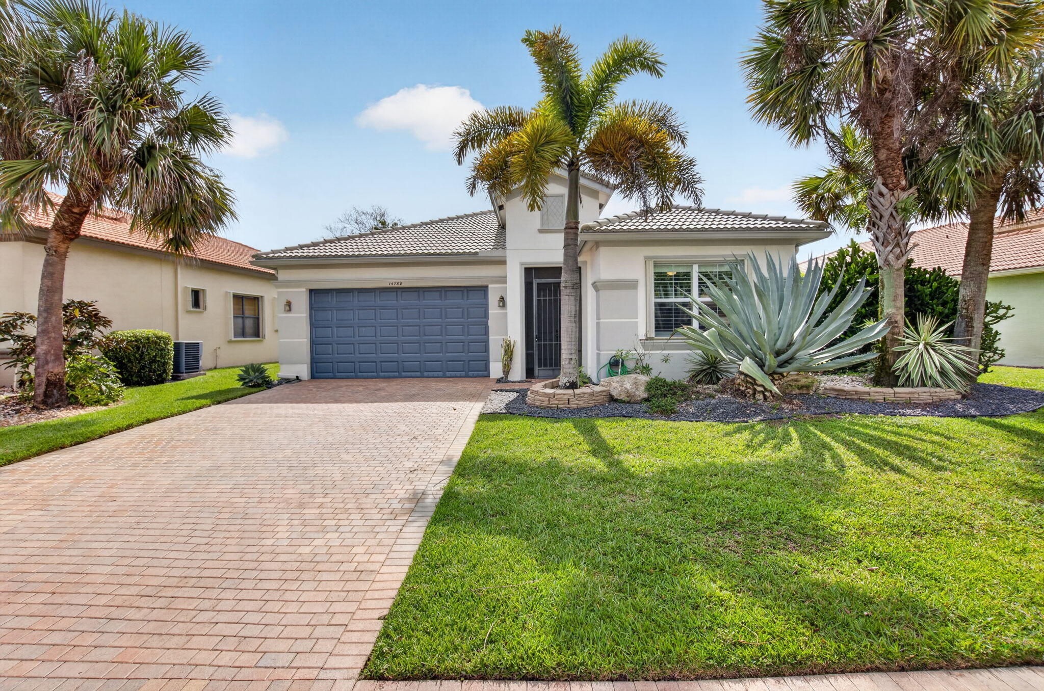 Rarely available Delray model ready for its new owners.  The 3 bedroom, 2 bath home was built in 2012 and provides a lake view that is both calming and beautiful.  This Great Room home has a large kitchen equipped with stainless steel appliances, granite counters and backsplash and 42 in wood cabinetry.  The kitchen opens up to the Great Room and Dining Room making this home perfect for entertaining friends and family.  The third bedroom has a barn door entry, but no closet but includes a Murphy Bed system with closet storage space.  The second bathroom has a tub/shower combination.  The primary bedroom is large enough to fit any size bedroom set and the two fitted walk in closets provide ample space to organize your wardrobe.  The primary bathroom has dual vanities and a walk in shower.   Outside, you will enjoy the enlarged screened lanai overlooking a beautiful lake allowing you to enjoy a morning cup of coffee or a nightcap whether you are just getting your day started and unwinding after a long day.  The home's solar panel system is an efficient way to keep your home cool without worrying about high utility payments.  Four Seasons at Delray Beach is a boutique community made up of 315 homes.  There are 21 different floor plans in the community which makes Four Seasons unique among other communities of its size.  Amenities are plentiful including har tru tennis courts, pickle ball courts, bocce and table tennis.  A state of the art fitness center, with organized classes and water areobics are also available to all residents.  Cable, internet, lawn service, 24/7 guard service, exterior house painting and roof cleaning are all included with your HOA fees. A capital contribution equal to two quarters of HOA fees will be due, by the buyer, at closing.  You have choices when purchasing a home, but come take a look at Four Seasons at Delray Beach before making that big decision.  You will not be disappointed.