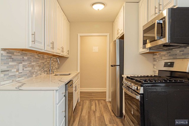 Just renovated! This SPACIOUS and gorgeous two bedroom has everything you could need. Featuring a stunning eat-in kitchen with stainless steel appliances, oversized bedrooms and living room, and ample storage for the home. Unit comes with 1 parking space! Washers and dryers available within the building. Walking distance from NYC transportation, local restaurants and shops.