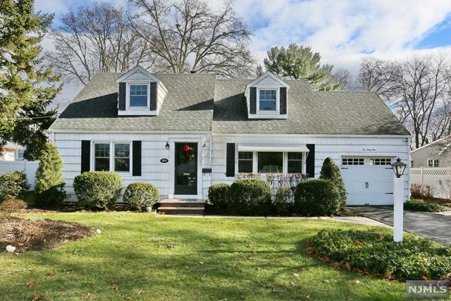 Welcome to this freshly painted 2-story Cape Cod Colonial, featuring 4 bedrooms and 2 full baths. Upon entry, the main floor reveals a large living room, dining room connected to a charming kitchen. Step down from the kitchen into a bright 4-season porch with access to a beautiful, large fenced in yard. Newly finished hardwood floors imparting a sense of luxury. The full basement offers a laundry and utility room, accompanied by extra usable space for your personalized needs. Located close to all 3 schools, this residence ensures a convenient commute with easy access to NYC transportation, all major highways, and plenty of shopping. Tenant responsibilities include covering fees, the first $150 of repairs, yard and snow maintenance. Application, credit report, and tenant's insurance are required.