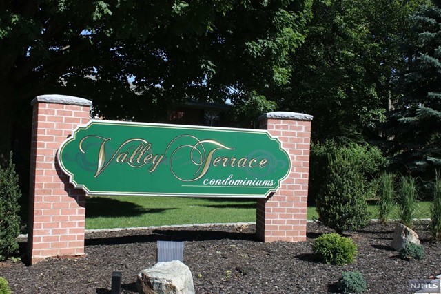 First floor unit in Valley Terrace offering 2 bedrooms and 1 & 1/2 bathroom. The living room is open and inviting. Upgraded kitchen / updated appliances and cabinet space. Large window opening from kitchen leads dining area. 2 nice size bedrooms. Updated full bathroom with walk-in shower. 1/2 bath access in one of the bedrooms. The Valley Terrace community offers association pool and is conveniently located near NYC transportation, schools and shopping. Monthly maintenance includes heat, water and sewer.