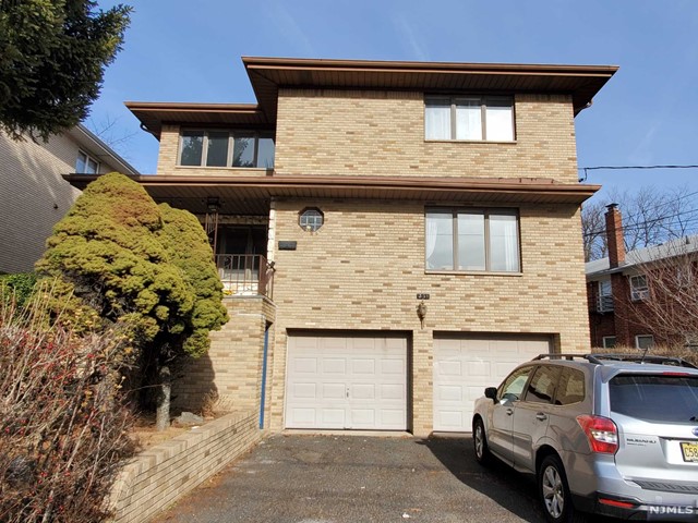 Current tenant will move out on 8/31/2022, unit is on 2nd floor of top/bottom 2-family house style with 3 bed room, 2 full bath, 1 car garage + 1 card drive way parking, C/air, all hardwood floor through out, south east facing, bright, move in condition, separate washer and dryer, separate utility(gas, electric) but tenant is responsible for 50% of water bill. tenant is responsible for snow removal on his/her drive way and own steps. landscaping is responsible by landlord. Only one block to EL public school and NYC bus stop. easy to access to PKW, GWB, hwy 95, 80, 46 and 1&9.