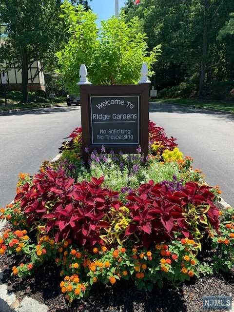 Welcome to Ridge Gardens. Enjoy this 1st floor 1BR/1BA end unit in this beautifully landscaped community. This modern condominium offers a living room, dining room, kitchen, private terrace, generous size walk-in closet off the bedroom, in unit laundry, laminate wood floors, carpeting, tile, three good size hallway closets and a storage unit in nearby bldg. Amenities include pool, tennis courts & plenty of parking. Close to public transportation, shops, restaurants, hiking, parks, skiing and the town library. Don't miss this one.