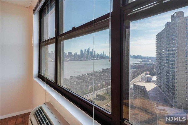 Wake up to the NYC skyline every morning! Flooded with sunlight, this newly available unit in Galaxy Towers includes two bedrooms and two bathrooms and features southeast NYC views. With 1337 sq ft, a spacious living area, plenty of closet space, and two large bedrooms, it will take quite a while for you to outgrow this space. Rent includes heat, electricity, water, and use of the amenities. Heating and cooling wall units in each room, laundry is available on your floor. Amenities include 24 hour concierge service; Indoor Pool redone within the last year, heated outdoor pool, Fitness Center, Tennis courts,; Lounge, Playroom, and sauna. Stainless appliances being installed in the kitchen. Management, shopping, and daycare all on-site. On-site rental parking is available. Apartment is available for immediate move-in.