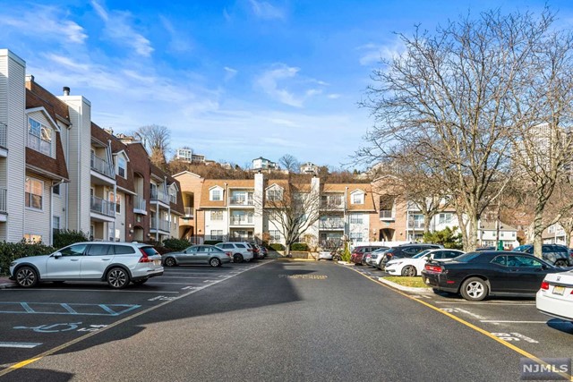 Welcome home to this sun-filled well maintained 2 bedroom, 2 full bath top corner unit in desirable Crown Village Condo Unit#523. Freshly painted thru-out, the open eat-in kitchen with skylight and plenty of living/dining space. Sliding glass door to a terrace. Southern facing master bedroom with master bathroom and second bedroom with full bathroom. Assigned parking space #155 is included, additional parking space is available for $35/Month. Plenty of visitor parking. Amenities include outdoor swimming pool, fitness center and community room. Minutes to NYC bus stops, Ferry, Trader Joe's, Whole Foods and Shopping centers.