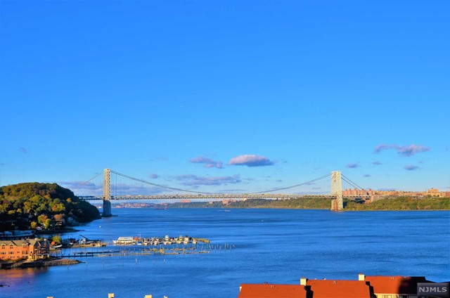 Move right into this beautifully updated 1 bedroom apartment home with ALL utilities and parking space included in the rent. This uniquely designed apartment home boasts amazing Hudson River, New York and George Washington Bridge views and is nestled in the heart of Edgewater, New Jersey with NYC Bus at entrance and conveniently located just minutes from NYC, Edgewater Ferry, shopping, fine dining, hotels and so much more. Features include a private glass balcony, updated modern pass thru kitchen, spa designed bathroom, spacious bedroom with two custom fitted closets and a separate bonus room that can be used for office. Tenants will be responsible for 1st months rent, 1.5 month security deposit, 1 month broker fee. $500 non-refundable move in fee, $750 refundable move in fee and renters insurance.