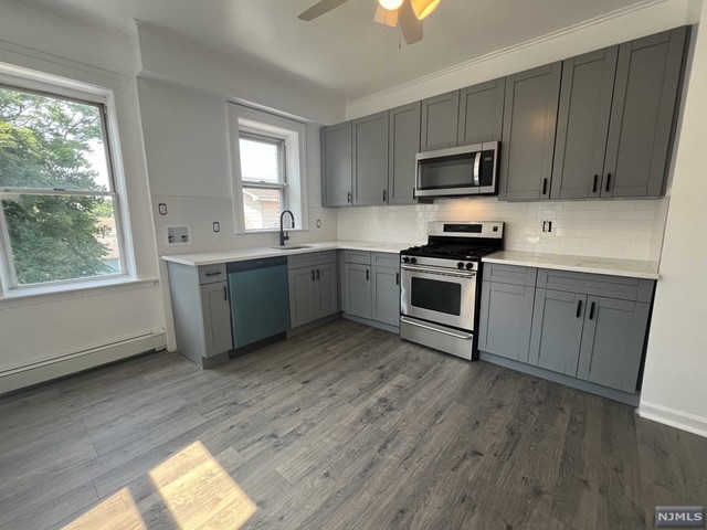Landlord pays half broker Fee. Tenant pays the other half! Recently updated 2 bedroom apartment with washing machine hookups in unit. Close to NYC bus and train. The kitchen is new with SS stove, dishwasher & microwave (refrigerator not included). Conveniently located next to shops, restaurants & schools. 1.5 Month security fee. No Pets of any kind are allowed. No smoking of any kind is allowed in the unit or on the premises. No backyard. The landlord requires a rental application, credit check, and proof of ability to pay.