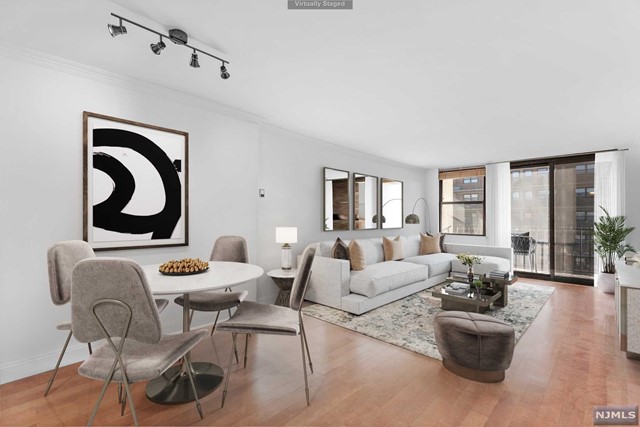 Gorgeous South Facing Unit, conveniently located midrise building - Bright Living Room opens to terrace Terrace with Southern Exposure and partial NYC views - Primary Bedroom with En Suite Bathroom - Spacious Kitchen with plenty of cabinets, stainless steel appliances and subway tile - Tankless hot Water Heater - Covered Parking - Storage Unit - Laundry in Unit- Marble Floor Lobby & Nice Elevator. Cool Building! Steps away from"The Avenue" a downtown district in Cliffside Park which features many cafes, restaurants, and shops as well as express transportation to Manhattan.