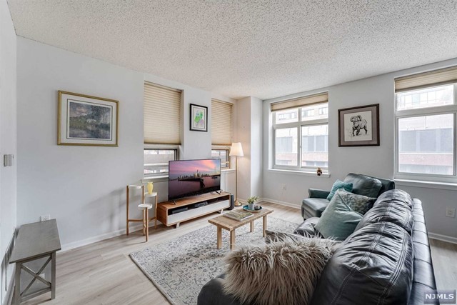 Right in the heart of Downtown Jersey City, you'll find this sunny and bright one-bed unit. This is what you have been waiting for! A renovated kitchen and central air conditioning in a quiet steel and concrete building. Large windows in every room and lots of storage. Step into your spacious oversized bedroom with high ceilings and amazing natural light. Washer and Dryer room on each floor. Garage parking space available in the building for an additional fee. Just a 2 block walk to the Grove Street PATH station, minutes to downtown Manhattan and a short ride to 34th Street in NYC, a commuter's dream! Close to restaurants, bars, and cafes. You'll be right in the middle of the new Provost Square redevelopment area. Enjoy historical-looking Powerhouse Arts District buildings & new glass tower ground floor retail as this neighborhood continues to thrive and grow. Look no further!!