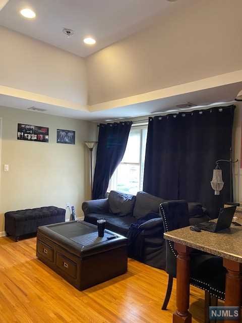 Move In Condition second floor apartment featuring a nice size Living Room with a high ceiling along with a full kitchen and an Island for your dining. A full size Bedroom and a Full Bathroom. A large deck off the back of the apartment to enjoy your morning coffee and your local newspaper.
