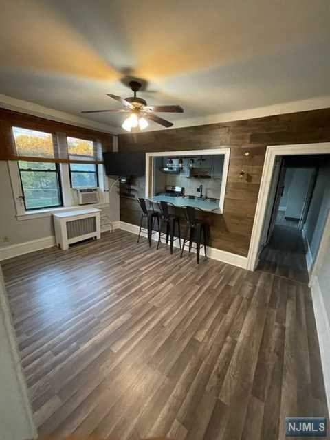 "COMMUTERS' DREAM" A bright 2 Bedroom/2 bath + Loft Addition apartment features include plenty of windows throughout the apartment for natural sunlight, new hardwood floors,and fresh paints. Bus stop to Hoboken at the door/ NYC bus stop just 2 blocks, Playground and Park, Elementary and Middle School,Tennis court, Shopping, all nearby!! Available along with plenty of street parking. Laundry in the basement. INCLUDED:Smart TV,AC units in all three rooms,bar stools for the dining, PET FRIENDLY