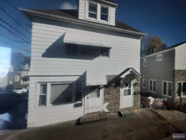 1st floor apartment features a large lr & dining area combo, kitchen, 2 br's, and full bath. 2 entrances. Master bedroom w/ 2 closets. Kitchen cabinets to be painted white w/ new hardware, new formica kitchen counter, apartment to be completely painted. Refrig included, stove to be replaced in a few months. Share yard and patio with 2nd floor tenant. Off street parking for 2 cars tandem under car port next to garage. Plenty of street parking as well. No pets, 1.5 month security. Proof of income, application and good credit a must. Possibility of laundry and storage in the basement in the future if tenant is a good tenant. Available 12/1/2022.