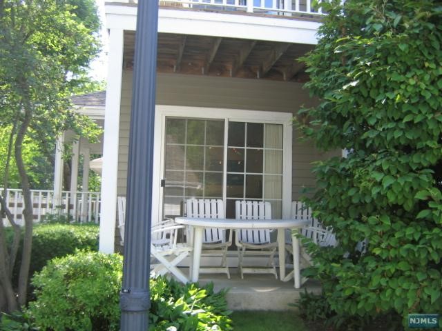 QUIET END UNIT IN WELL TAKEN CARE OF COMPLEX, MAHWAH HAS TRAIN & BUS CONNECTION TO NEW YORK CITY, ALSO NEAR MANY INTERNATIONAL COMPANIES, BAMBOO FLOORS THRUOUT MAIN LEVEL, LR HAS FPL & SGD TO PATIO, KITCHEN HAS WINDOW & NEW FLOOR & DISHWASHER, CONDO IS ALWAYS BRIGHT,SINCE EAST/SOUTH/WEST EXPOSURE, MBR HAS W/I CLOSET, NEW FLOOR IN FINISHED LOWER LEVEL, GREAT FOR FAMILY ROOM OR OFFICE, LOTS OF STORAGE IN SEPARATE ROOMS & LINEN CLOSET, LL BATH w/SS & BIDET, NEW.TOILETS IN BOTH BATHROOMS, NEW. A/C, GARAGE D DIRECTLY ACROSS FROM UNIT, POOL & PLAYGROUND CLOSE BY, CLUB HOUSE CAN BE RENTED FOR PARTIES, OWNER IS LICENSED REALTOR