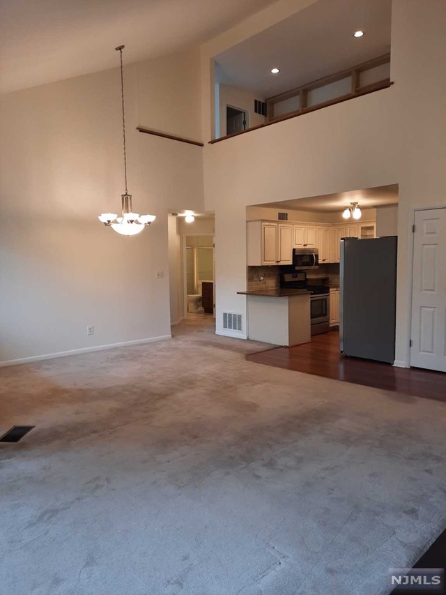 Beautiful move in condition condo in an excellent location!!....close to NYC transport, major highways & shopping centers.....condo features an updated kitchen with ss applicances!!, updated baths, self contained loft bedroom, private balcony & fireplace for cozy winter days!!..New central air unit. Fireplace, Chimney and flues are represented in "as-is"condition with no known issues.