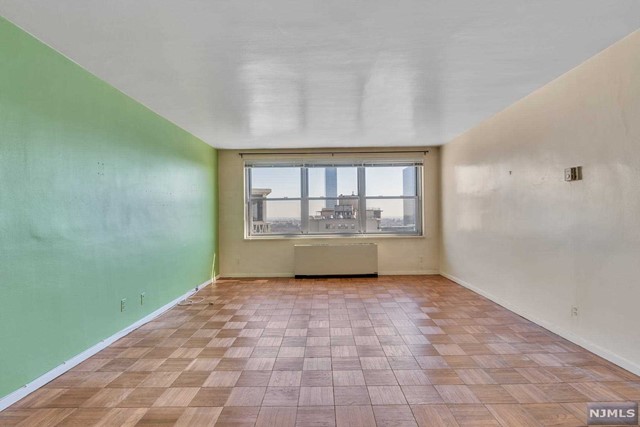Penthouse one bedroom coop with GWB and NYC views is now available for your personal touch. Enter into a welcoming entry foyer with eastern exposure. Kitchen can be made into an eat in room or opened up to the living/dining room. The living space is generous and has hardwood parquet floors in great condition. Bedroom view is of downtown NYC and Hudson River. Large walk in closet provides plenty of storage space as do the other 3 closets in the unit. Med North is perfectly located in Fort Lee and easily accessible to many local eateries, shopping and major NJ highways. NJ Transit stops on Linwood Ave for transportation to NY. Columbia-Presbyterian employees can avail themselves of the free shuttle right across the street. Med North offers 24/7 concierge/security service, full time management and maintenance staff, outdoor athletic courts and play areas for the kids. Parking is assigned after closing $90in/$75out. $69.50/month bulk cable package. Great opportunity to own !!!!!