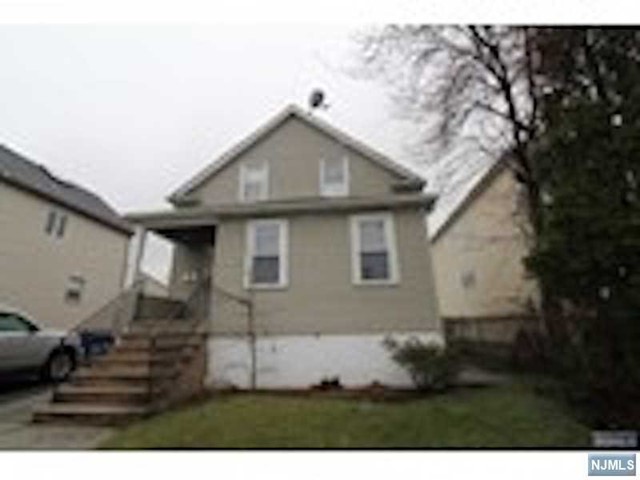 Renovated second floor of a two-family home. Entry leading to updated kitchen and full bath. Living room and bedroom complete the unit.