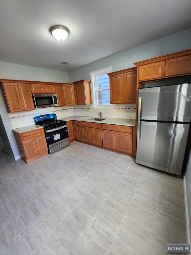Don't Miss Out on this Comfortable Recently Renovated 3 bedroom apartment with Central Heat and AC. With a Generous sized Foyer and Large Hall Closet at the entrance this unit provides exceptional closet space to meet the occupancy. Enjoy everything this unit has to offer from the new hard wood floors, bathroom, and kitchen with updated appliances. Don't Miss Out!! This won't LAST Long!!