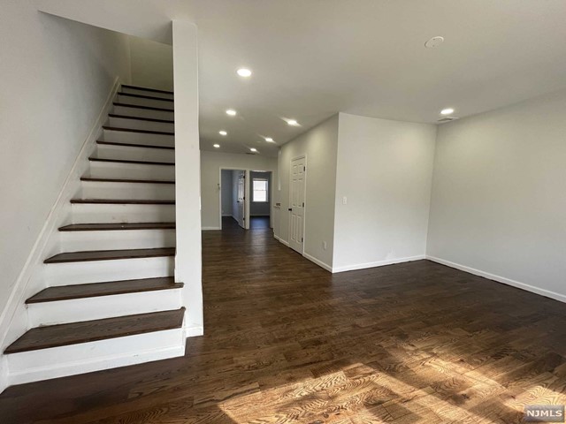 Beautifull apartment conveniently located near bus stop and within walking distance from shops, parks and schools. This unit offers 2 floors of living space. 2nd floor has 2 bedrooms, nice kitchen with all new cabinets, quartz counter tops and fully equipped with stainless steel appliances. Spacious and sunny living room and a full bath with exposed brick wall. 3rd floor has the 3rd bedroom and another room that can be used as a home office or additional bedroom if needed. Parking for 1 car, shared use of yard and laundry. This one is Pet Friendly