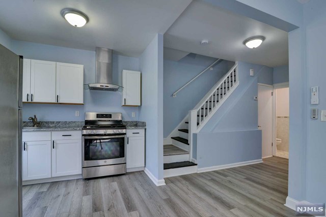 Beautifully updated 2nd & 3rd Floor living space with 3 bedrooms, living/dining area, full bathroom, kitchen with granite counter-top, stainless steel appliances, AC, assigned parking and laundry facilities. Tenant pays their own utilities. Requirements for tenancy includes Income verification (must be minimum 2X rental amount), credit and background check via NTN application.