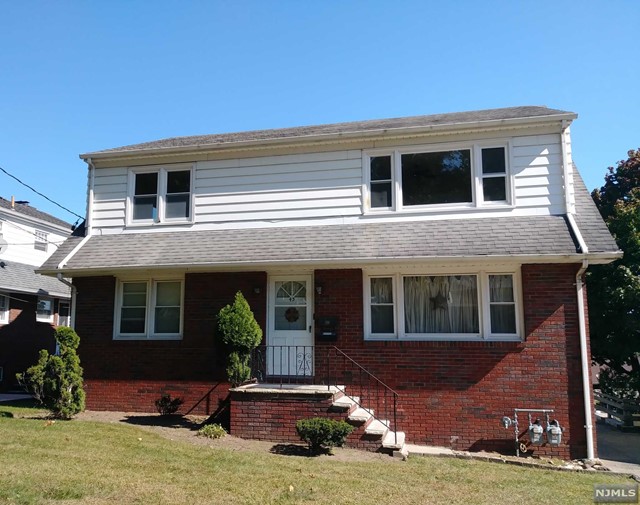 Spacious, bright and freshly painted 2nd flr apartment. Large kitchen with plenty of cabinet space. Large rooms, hardwood floors, great closet space plus lrg basement storage & shared use of the back yard. Double closets in the bedrms. Convenient to Goffle Brook Park & NYC train. Just up the street from K-5 school. Tenant responsible for gas & electric, tenant insurance, and first $150 each repair. Landlord maintains landscape and snow removal. Refrig, washer, dryer and window a/c units are included for tenant's use...LL will not repair or replace. No pets and no smoking in the apartment or on the grounds.