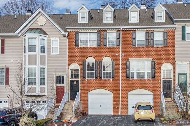 Bright and beautiful townhouse in Mahwah will make you feel right at home. Three floors of living space featuring two bedrooms and two-and-a-half baths along with eat-in-kitchen, living room and formal dining room. Finished basement with new hardwood floors leads to an oversized garage. Laundry on the second floor, tons of closet space, and luxury amenities including swimming pool and tennis courts. Just steps away from shopping, parks and the Mahwah train station. Don't miss out on making your dreams of home ownership a reality! Professional photos COMING SOON!