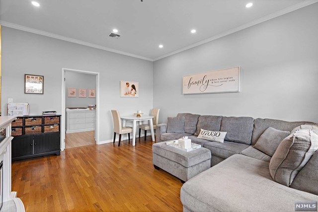Welcome to Unit 26 at 1110 Clinton Street, Hoboken a stunning 2-bedroom, 1.5-bath condo nestled in the historic Propeller Works building. Step into a spacious living area featuring hardwood floors and an open floor plan that maximizes space and natural light. The chef's kitchen boasts stainless steel appliances and ample counter space perfect for cooking and entertaining. Both bedrooms are generously sized with ample closet space. Additionally, enjoy the convenience of an elevator in the building and on site parking. Enjoy breathtaking views of NYC from the shared rooftop, ideal for unwinding or entertaining guests. Located in uptown Hoboken, close to shopping, dining, parks, schools, and multiple transit options into NYC. Experience the best of city living at 1110 Clinton St #26.