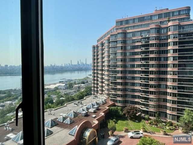 WELCOME TO DESIRABLE CARLYLE TOWERS. BOASTING SOUTH VIEWS OF HUDSON RIVER & NEW YORK SKYLINE FROM EVERY ROOM. PLUS, A COZY TERRACE, BOSCH STAINLESS STEEL APPLIANCES, 9' FOOT CEILINGS WITH BAMBOO HARDWOOD FLOORS THROUGHOUT, A SPACIOUS BEDROOM, IN-UNIT LAUNDRY AND LARGE WINDOWS FOR PERFECT SPACE TO BE A HOME. 24-H DOORMAN & SECURITY, OUTDOOR HEATED POOL, GYM, LIBRARY, KID'S PLAYROOM, 24H VALET PARKING. EASY COMMUTE TO NYC BY NJ TRANSIT OR FERRY. FEE DUE AT SIGNING OF LEASE: 1.5 MONTH SECURITY DEPOSIT, 1ST MONTH RENT. (Building move in fee $800 application fee, $600 Building Move-in fee, and a refundable $500 damage security deposit)