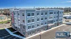 Introducing a beautiful 1-bedroom, 1-bathroom apartment in a luxury building. This unit boasts new appliances and includes a washer and dryer for added convenience. Situated close to train and bus transportation, with parking included, it offers easy access to commuting. Additionally, its proximity to shopping, restaurants, and schools makes it an ideal location. With ample closet space, this apartment is a must-see!