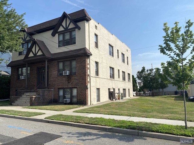 Rare opportunity to own a legal 5 family home in Wood Ridge situated on a 100x100 lot with 4 car detached garage plus tandem spot for 2 cars. 4 of the units offer 1 bedroom, living rm, dining rm, eat in kitchen and full bath. The 5th unit has living rm, eat in kitchen,2 bed rooms and full bath. There are 6 gas meters and 6 electric panels. One newer furnace and one hot water heater. Landlord pays heat and water. Separate work shop and storage area. New fire system in common area. Conveniently located near transportation, restaurants and shopping.